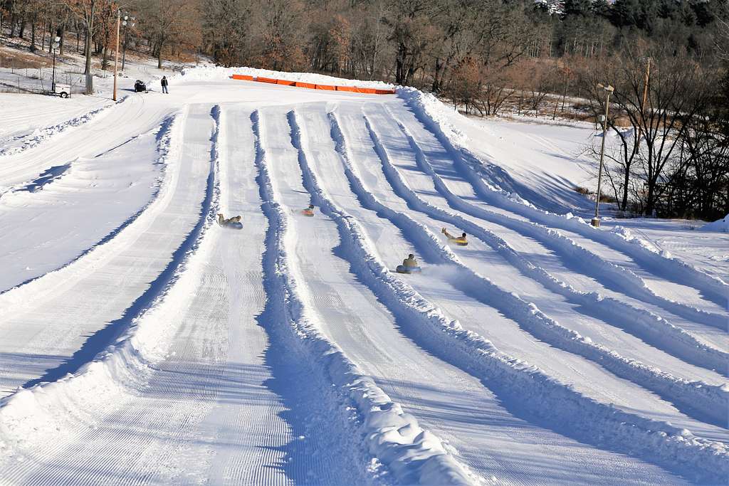 Snow-tubers slide down snow-tubing lanes at Whitetail - PICRYL - Public  Domain Media Search Engine Public Domain Image