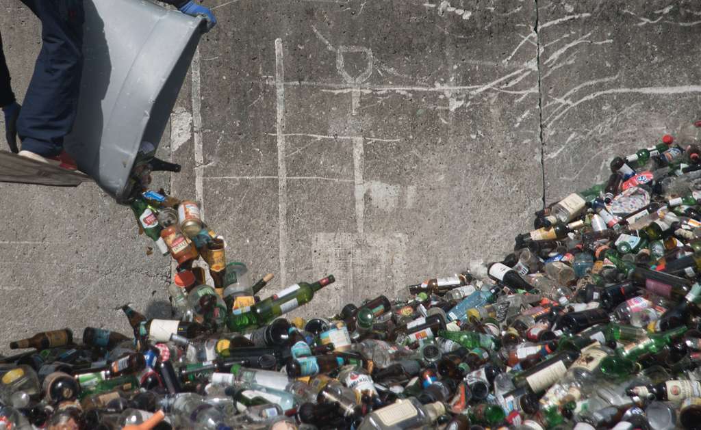 https://cdn2.picryl.com/photo/2018/01/18/a-recycling-worker-unloads-recyclable-glass-into-a-96690e-1024.jpg