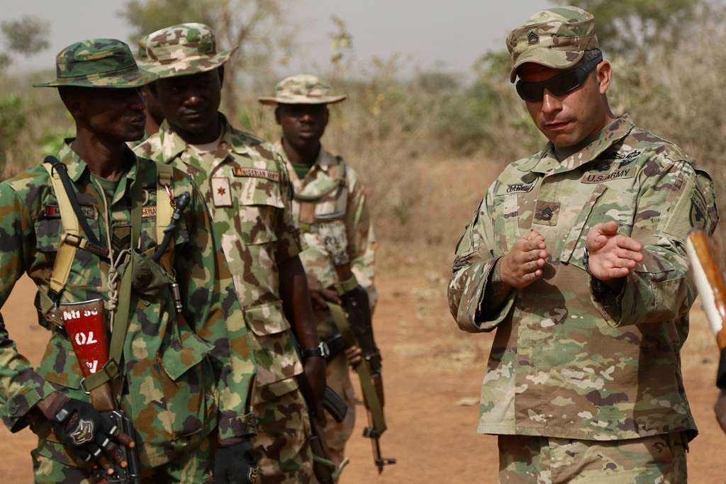 Two snipers of the 68th Armour Regiment's 1st Battalion are pictured with  their M107 Long Range