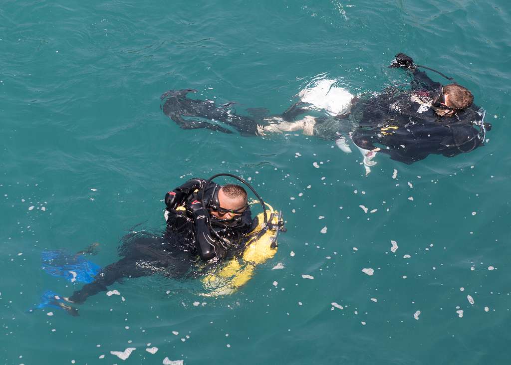 A U.S. Navy Seabee from Underwater Construction Team - NARA & DVIDS ...