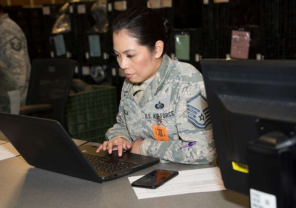 An Airman with the 60th Aerial Port Squadron, checks - NARA & DVIDS ...