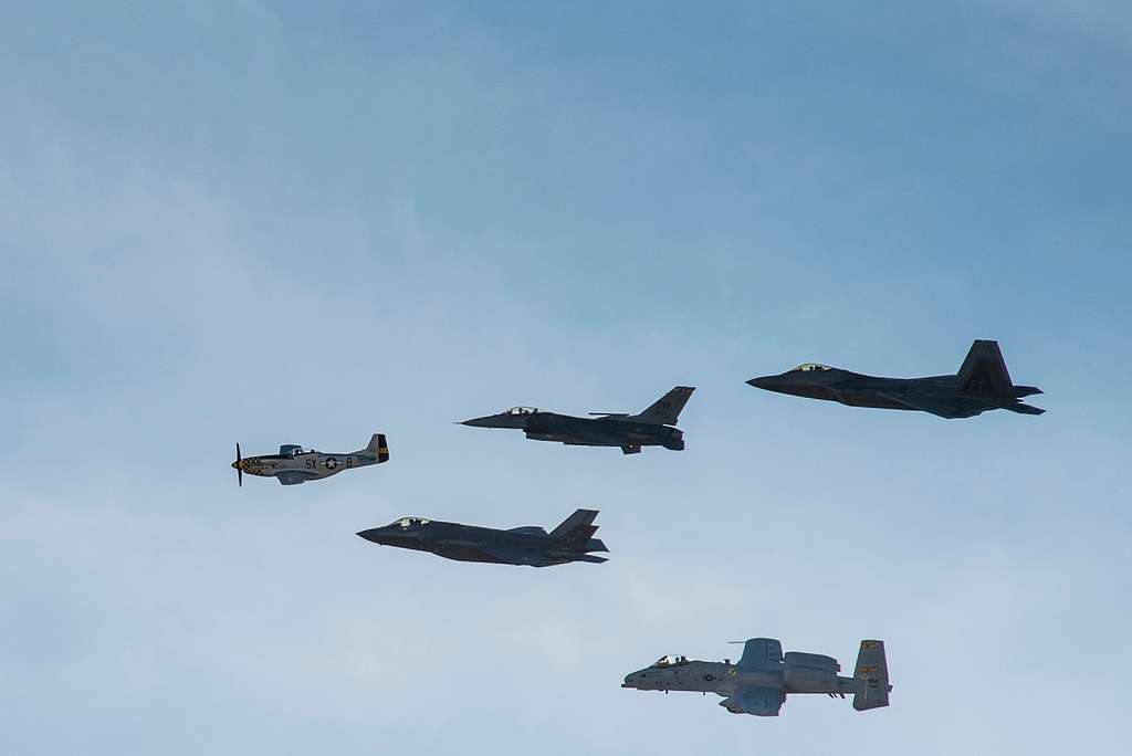 A five-ship formation consisting of a P-51 Mustang, - PICRYL Public ...