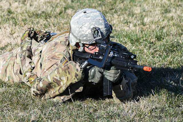 Army Sgt. Michael Zamora assumes a prone fighting position - PICRYL ...