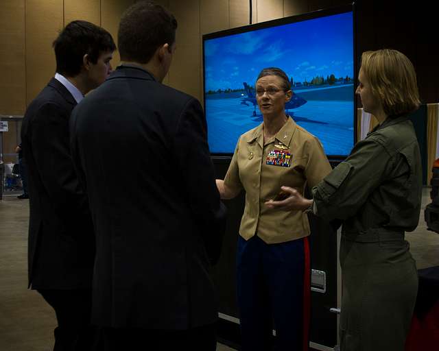 Frouke Beeksma, an athlete of the Royals Swimming Team at the Queens  University of Charlotte, participates in Marine Corps water survival  training during United States Marine Corps' 2018 Marine Week in Charlotte