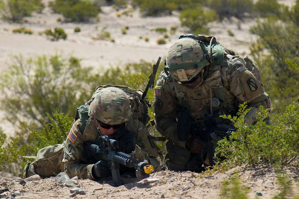 Spc. Chris Triplett, left, a combat engineer, and Army - NARA & DVIDS ...