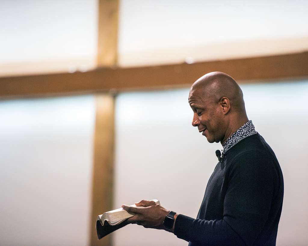 From left, U.S. Air Force Col. John Klein, 60th Air Mobility Wing  commander, former Major League Baseball player Darryl Strawberry, and Col.  Kenneth Reyes, 60th Air Mobility Wing chaplain, pose for a