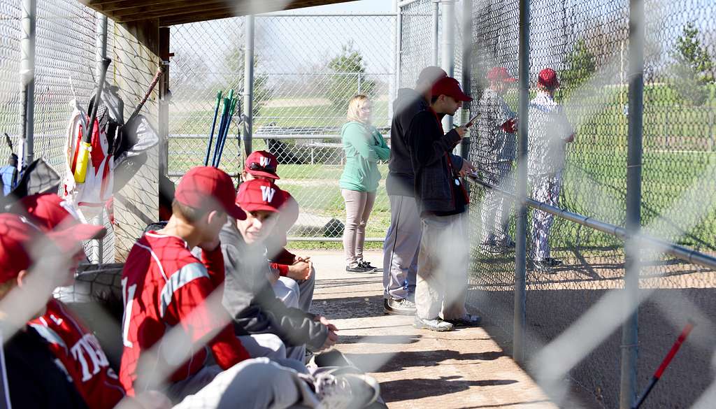 Ghost players give a youngster a chance to bat at the original Lansing  Farm site in Dyersville, Iowa, where the nostalgic movie Field of Dreams  was filmed in 1989