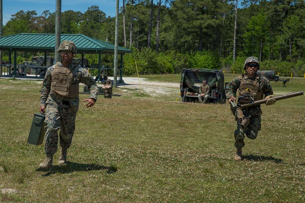 U.S. Marine Corps Sgt. Daniel Williford left and PICRYL