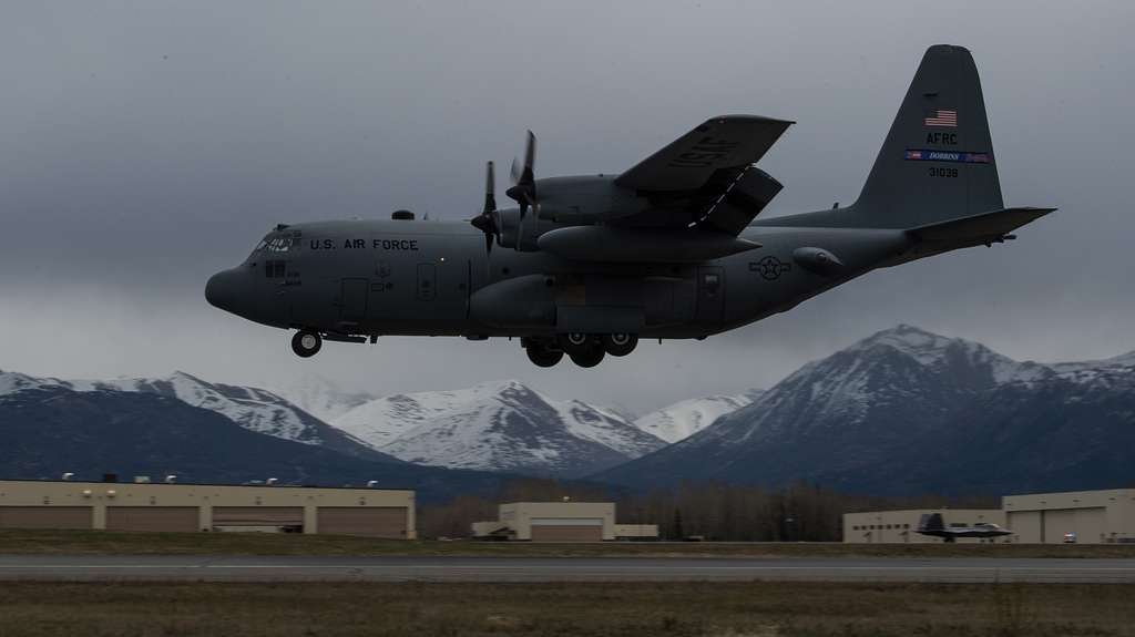 A C-130 Hercules Approaches The Flightline For Landing - Nara & Dvids 