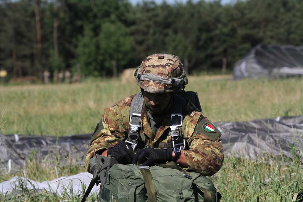 A paratrooper with the Italian Armed Forces prepares - NARA & DVIDS ...