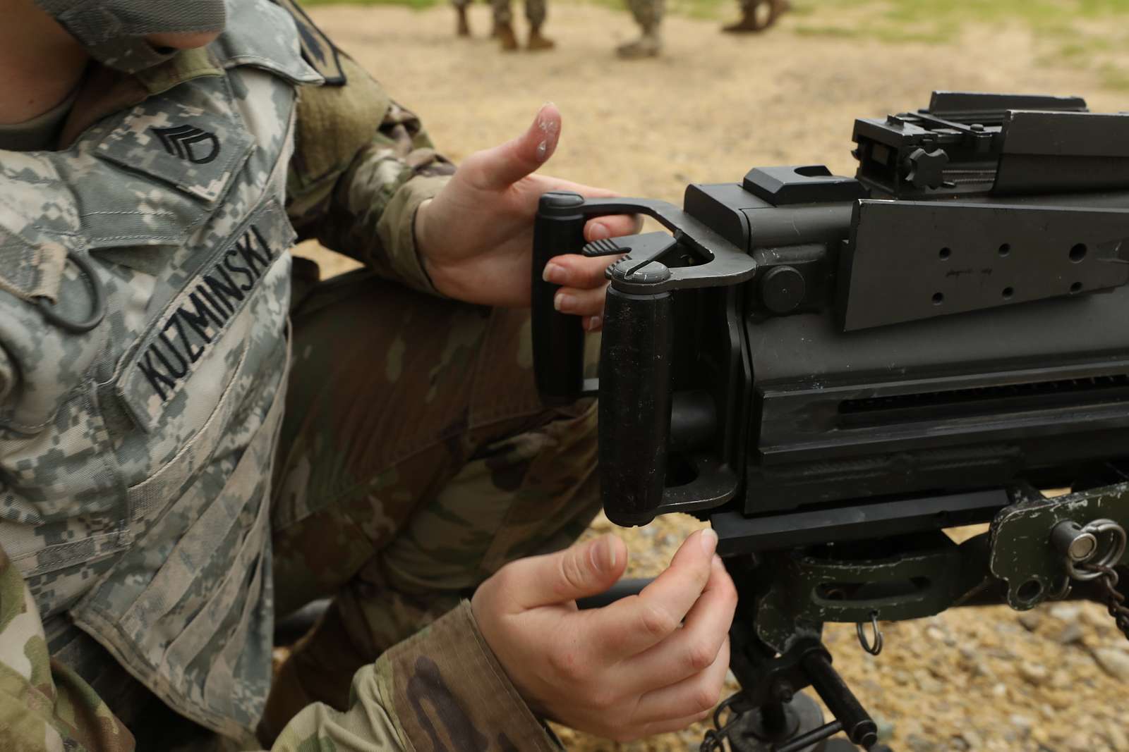 Sgt. 1st. Class. Richard Erskine, a jumpmaster for 1st Brigade Combat Team,  82nd Airborne Division, demonstrates how to properly hook up his static line  during a pre-jump class at Robert Gray Army