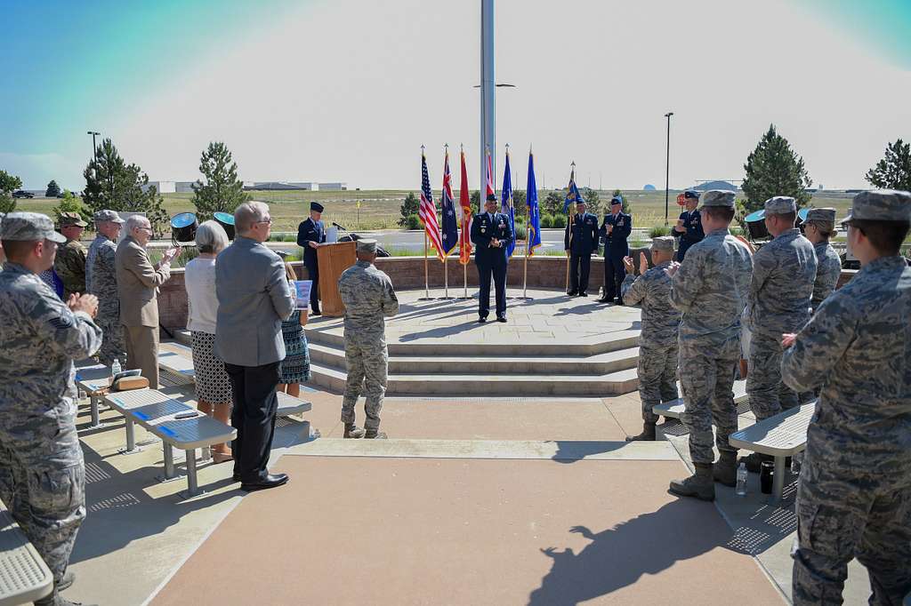 Col. Lorenzo Bradley, 460th Operations Group commander, along with