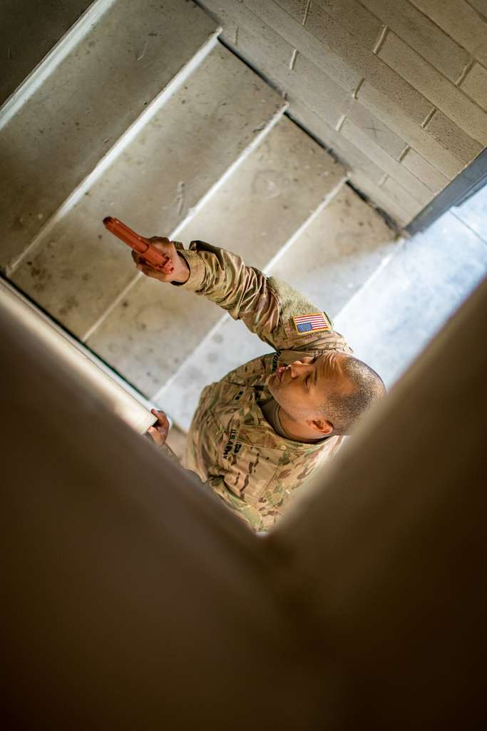 Capt. Jamika Bryant, Commander of headquarters and headquarters company,  335th Signal Command (Theater), returns from an M16 rifle qualification  range at Joint Base McGuire-Dix-Lakehurst, New Jersey. Lightning Strike 18  is the two-week