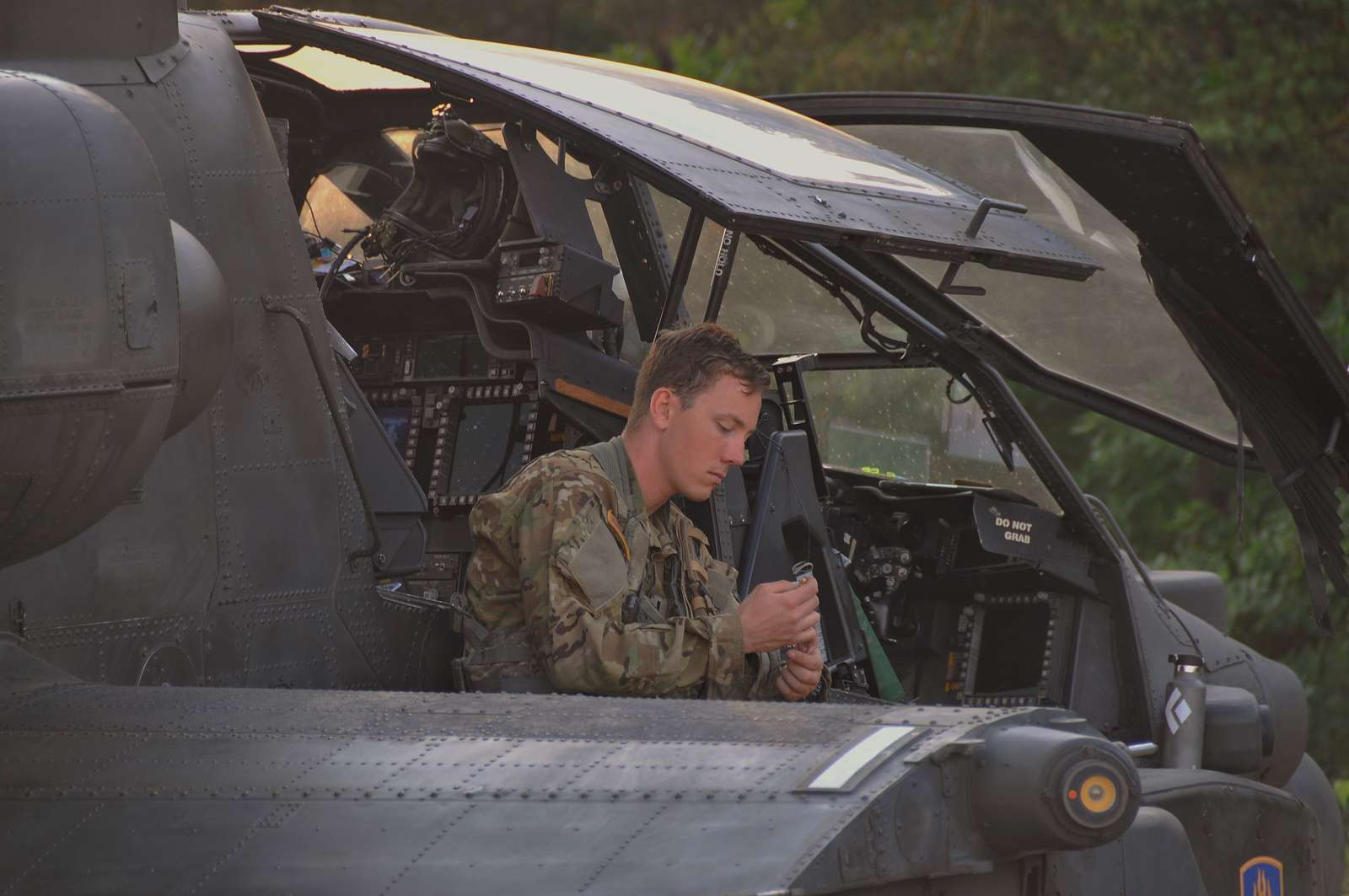 A U.S. Army Apache helicopter pilot assigned to Task - NARA & DVIDS ...