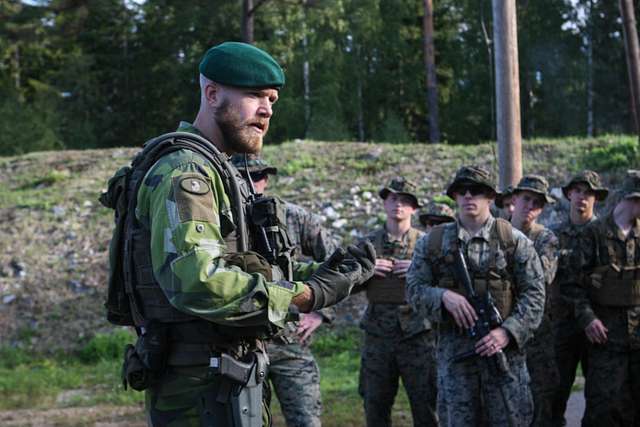 A Swedish Coastal Ranger with 1st Marine Regiment gives - NARA & DVIDS ...