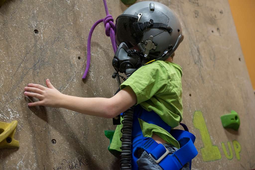 Rock climbers on a rock wall closeup. Climbing gear and equipment