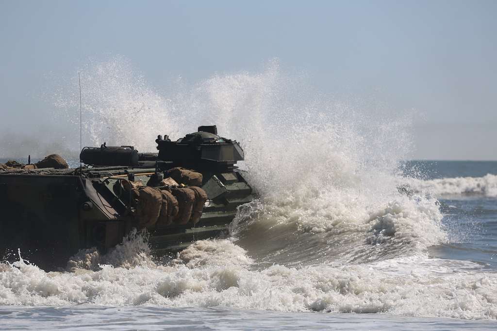 An Amphibious Assault Vehicle enters the water from - NARA & DVIDS ...