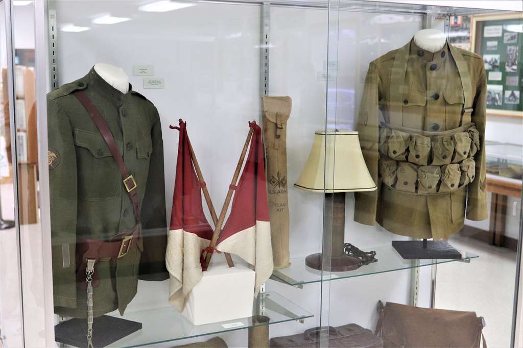 A display case of World War I-era artifacts is shown - PICRYL - Public ...