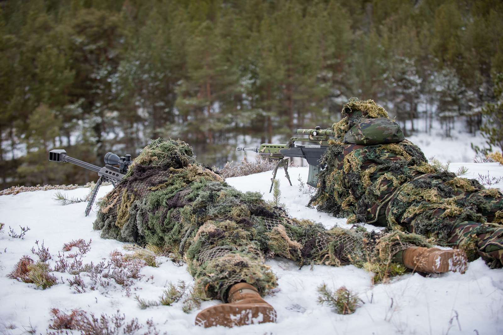 U.S. Army Staff Sgt. Anthony Marotta, right, and Sgt. Jeff Angle, UH-60L  Black Hawk helicopter crew chiefs with the New Jersey National Guard's  1-150th Assault Helicopter Battalion, conduct gear checks before hoist