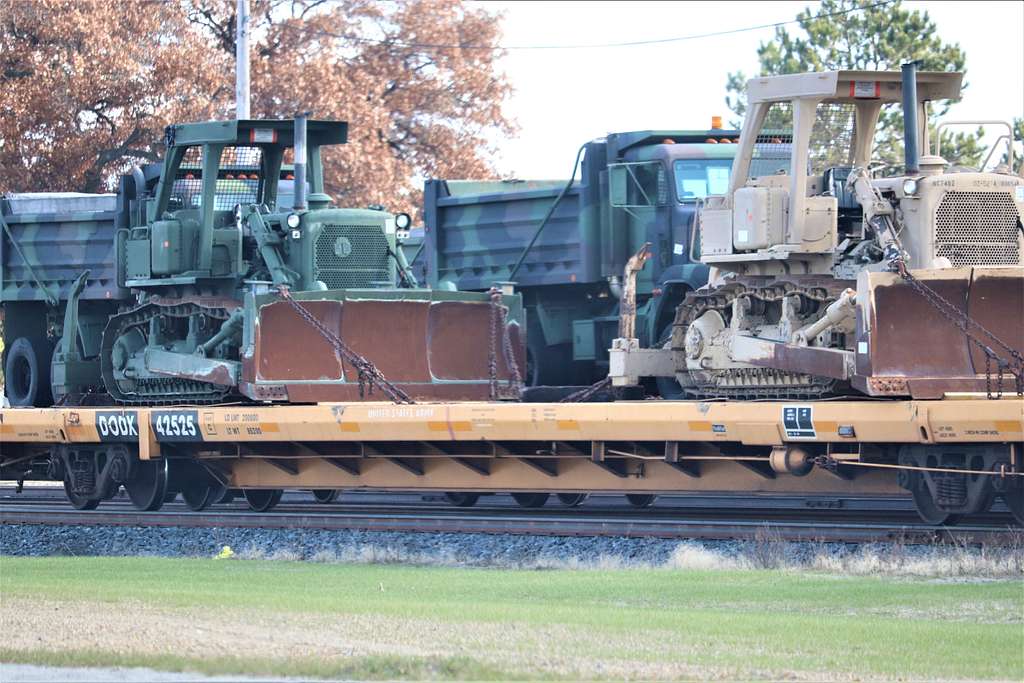 Railcars loaded with Army vehicles and equipment are - PICRYL Public ...