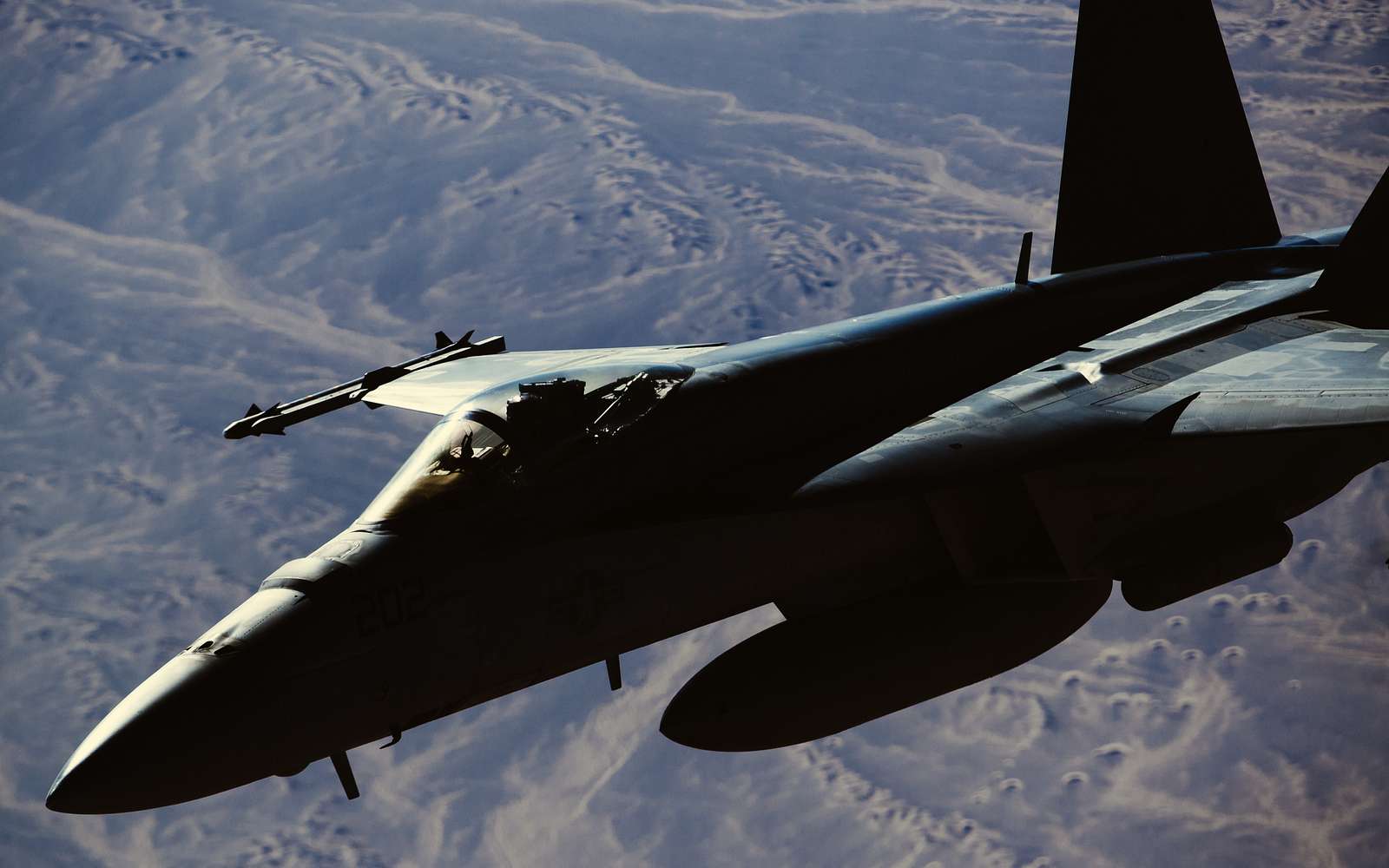 A U.S. Navy F/A-18 Super Hornet Peels Away From A 28th - NARA & DVIDS ...