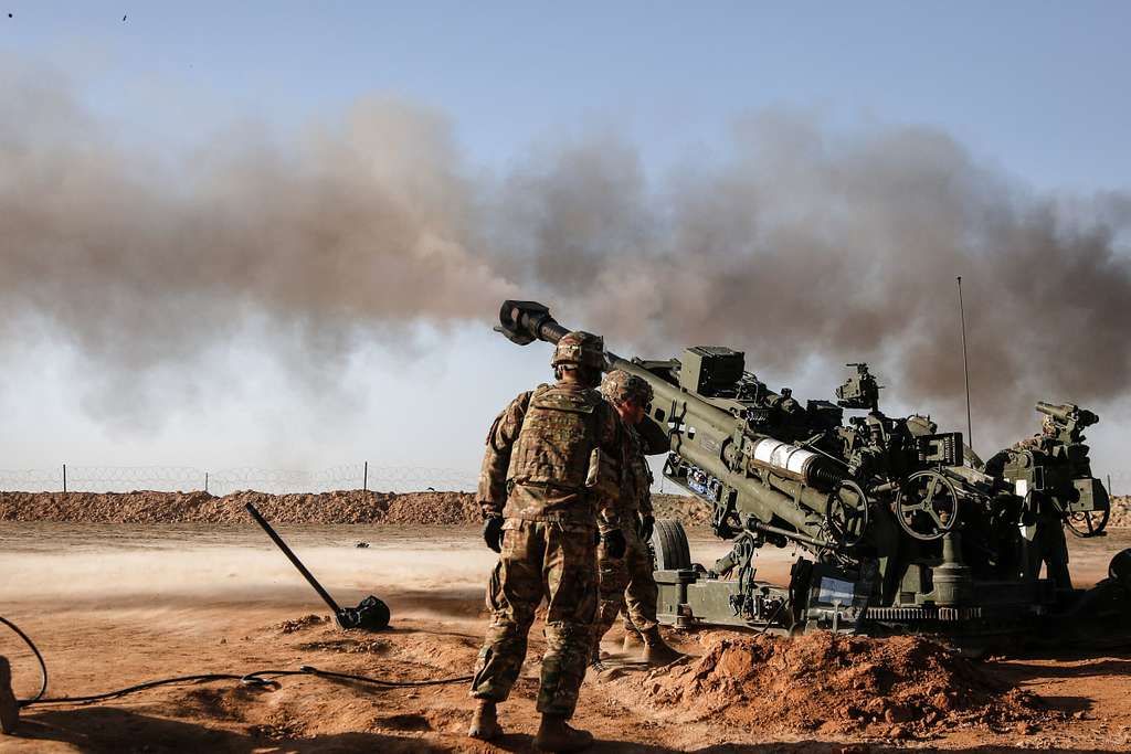 Soldiers of the 101st Airborne Division fire the M777A2 - PICRYL ...