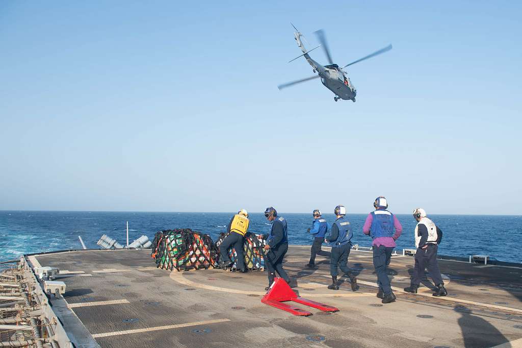 USS Leyte Gulf Conducts A Vertical Replenishment With The USNS Cesar ...