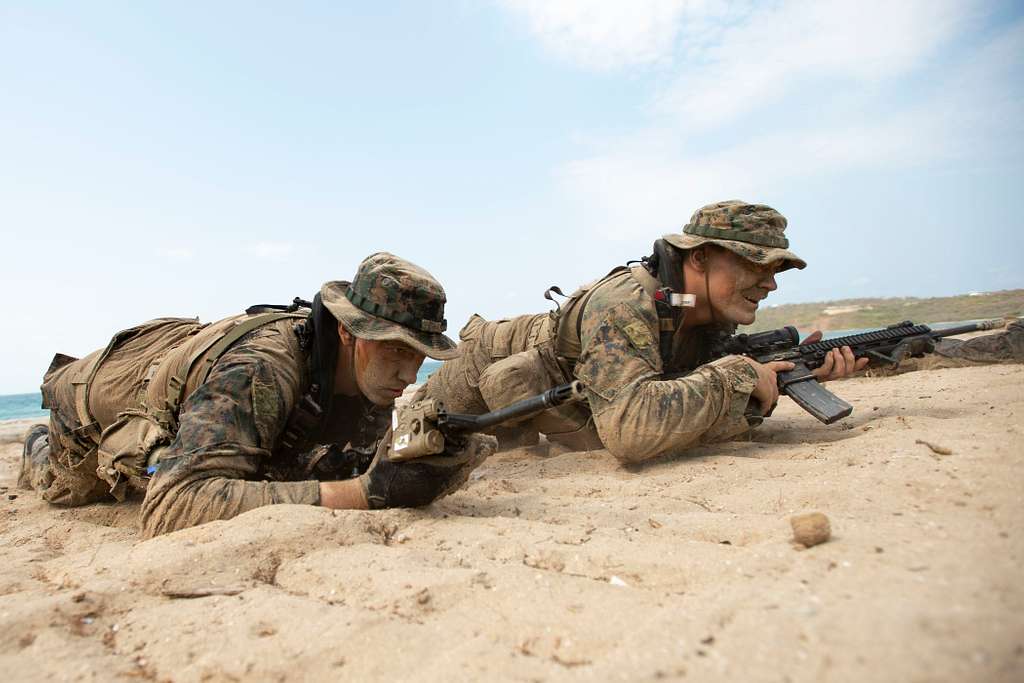 U.S. reconnaissance Marines storm a beach during an - PICRYL Public ...