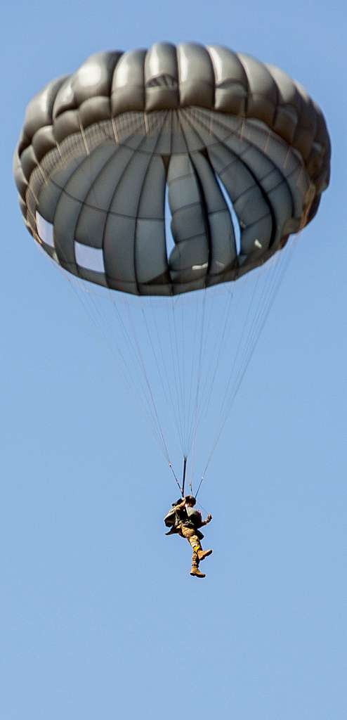 A Group of U.S. Army Paratroopers parachute onto - NARA & DVIDS Public ...