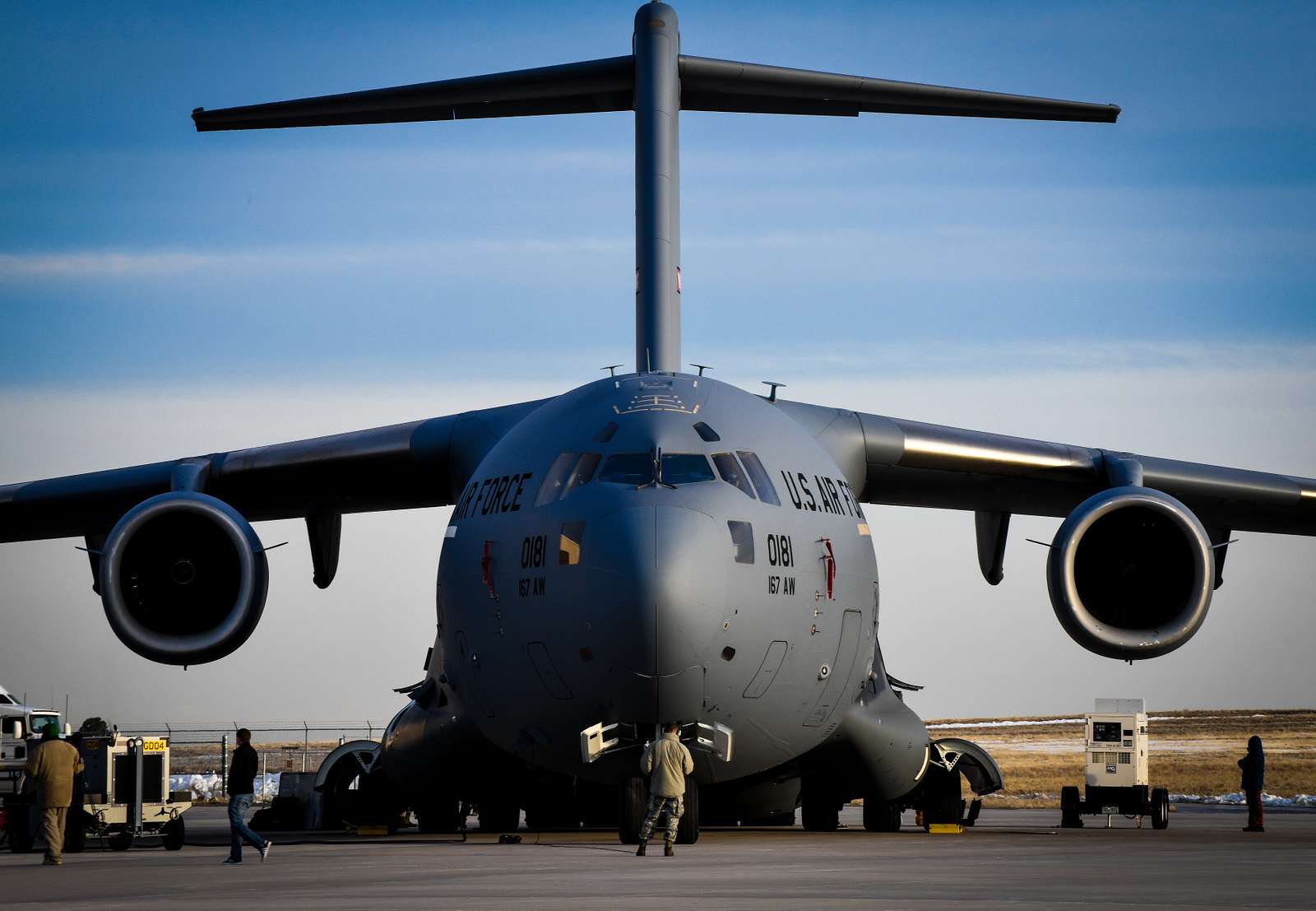 A C-17 Globemaster Iii Sits On A Flightline March 19, - Nara & Dvids 