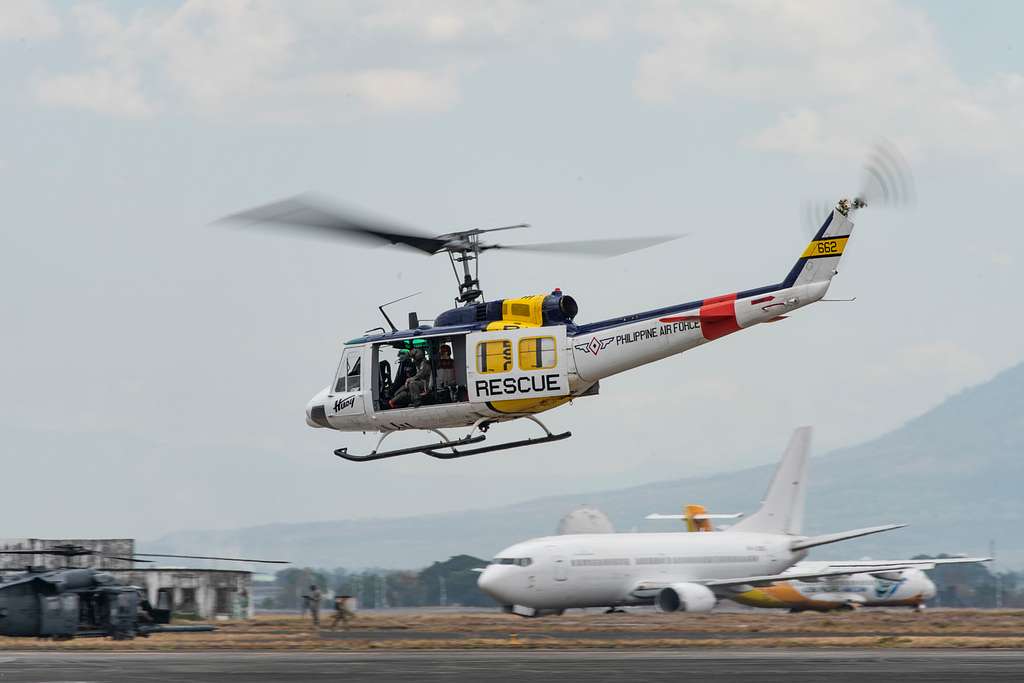 A Philippine Air Force UH-1 Huey Lifts Off In Preparation - NARA ...