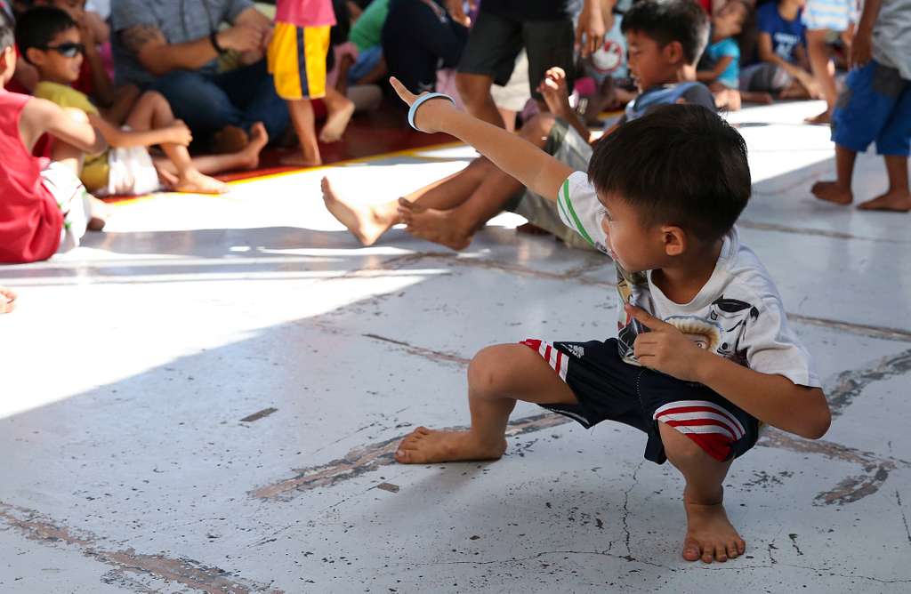 A child completes his dance routine at the Gentle Hands - NARA & DVIDS ...