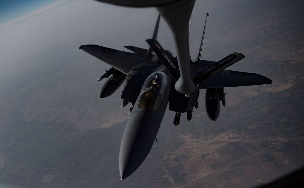 An F-15e Strike Eagle Receives Fuel From A Kc-135 - Picryl Public 