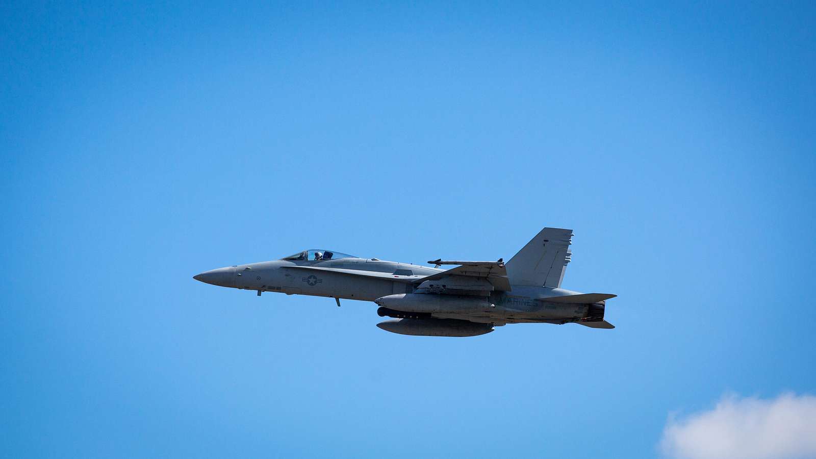 A U.S. Marine Corps F/A-18 Hornet conducts flight operations - NARA ...