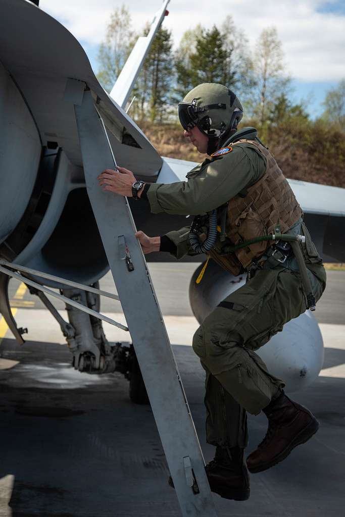 U.S. Marine Corps Lt. Col. Michael Clark Climbs Into - NARA & DVIDS ...