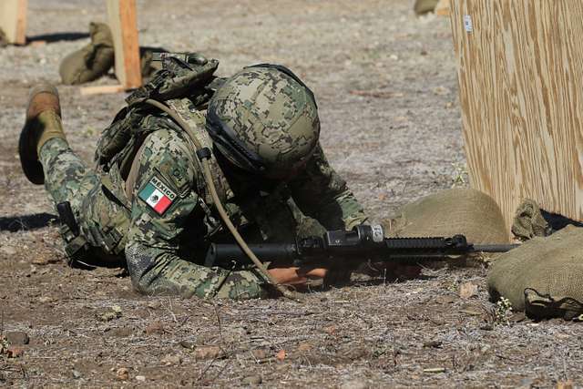 A Mexican Marine completes weapons training during - NARA & DVIDS ...