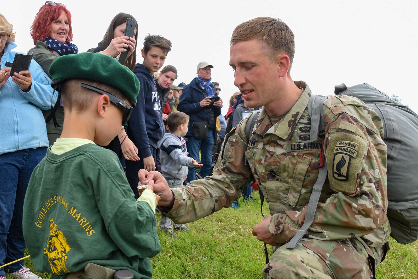 A U.S. Paratrooper With 173rd Airborne Brigade Hands - NARA & DVIDS ...