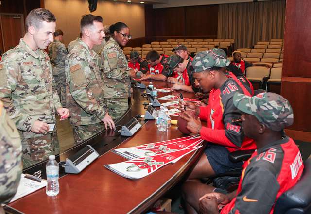 USCENTCOM commander delivers Oath of Enlistment during Buccaneers game