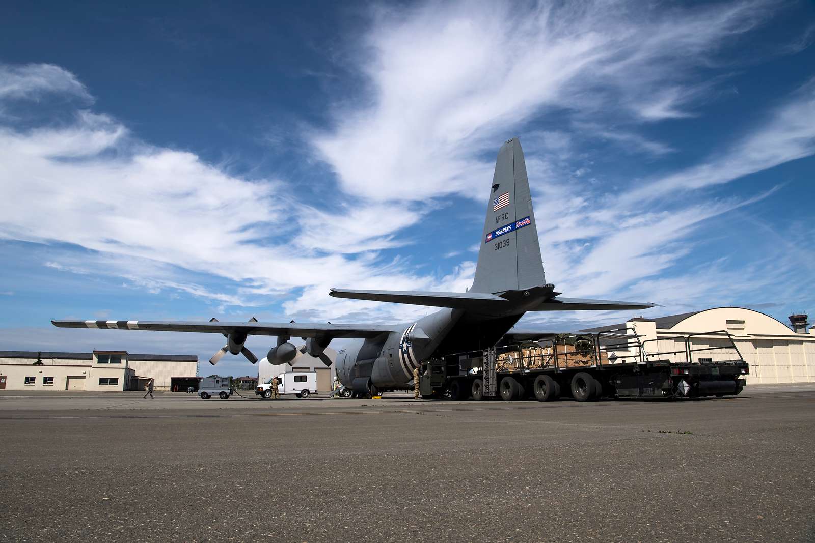 A C-130 Hercules crew from the 700th Airlift Squadron, - NARA & DVIDS ...