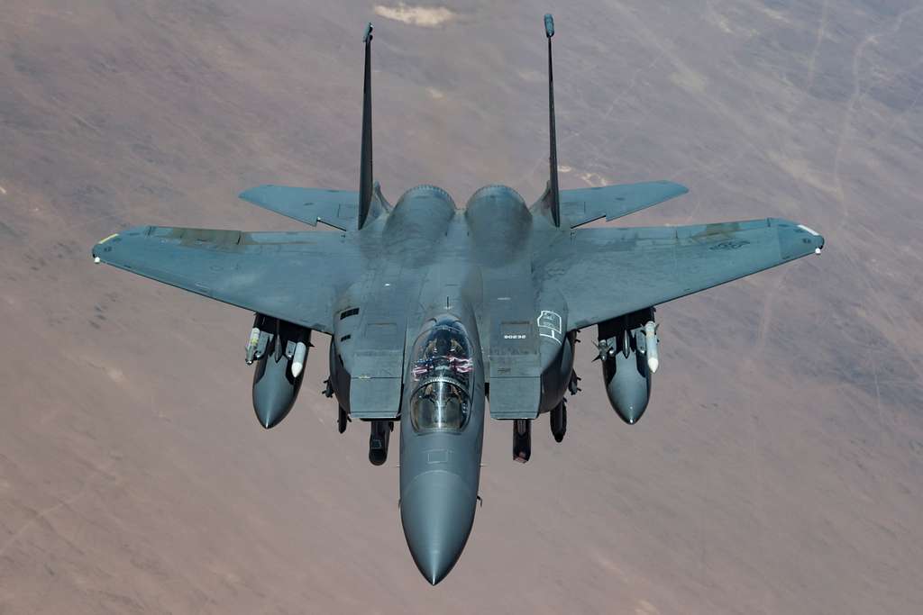 A U.S. F-15E Strike Eagle breaks away after refueling - NARA & DVIDS ...