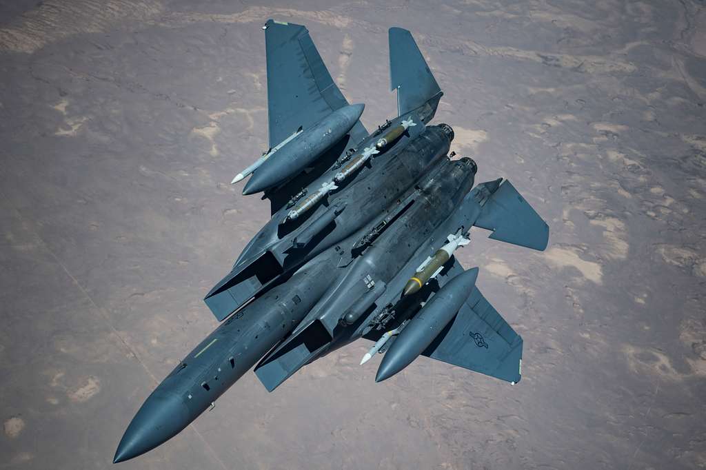 A U.S. F-15E Strike Eagle breaks away after refueling - NARA & DVIDS ...