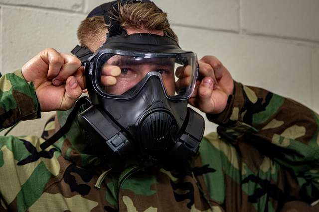 A U.S. Naval ROTC Midshipman breaks the seal to his - NARA & DVIDS ...