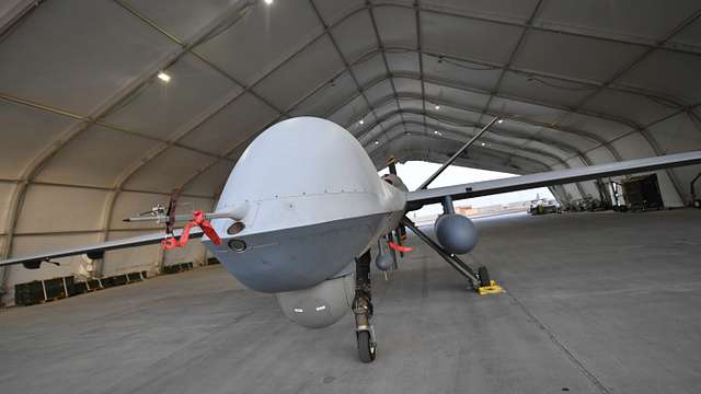 An MQ-9 Reaper unmanned aerial vehicle awaits an engine - NARA & DVIDS ...