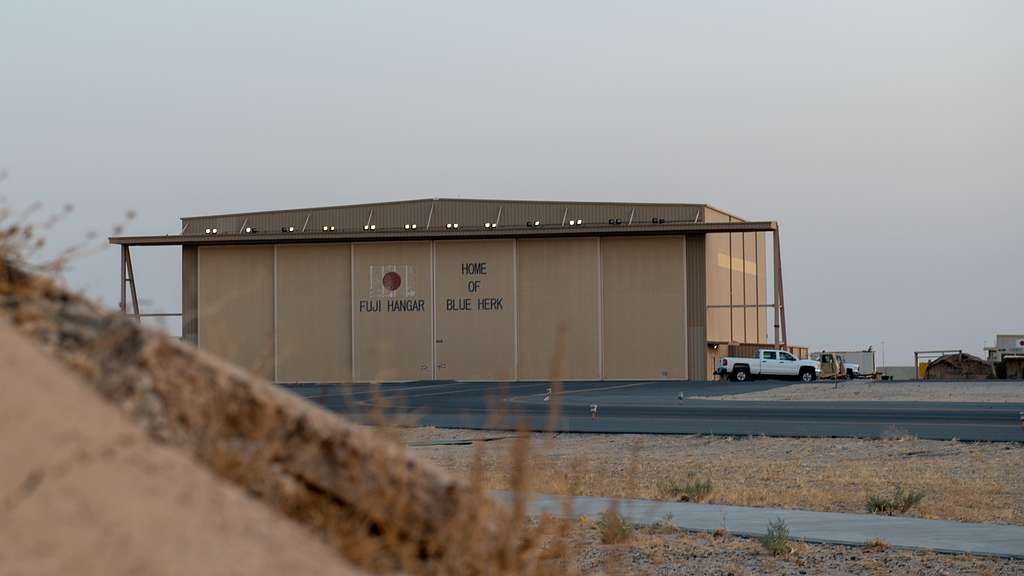 A hanger sits in the sunset at Ali Al Salem Air Base, - NARA & DVIDS ...