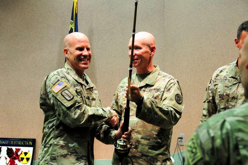 U.S. Army Major James Bowden presents Lt. Col. Joel - NARA & DVIDS ...