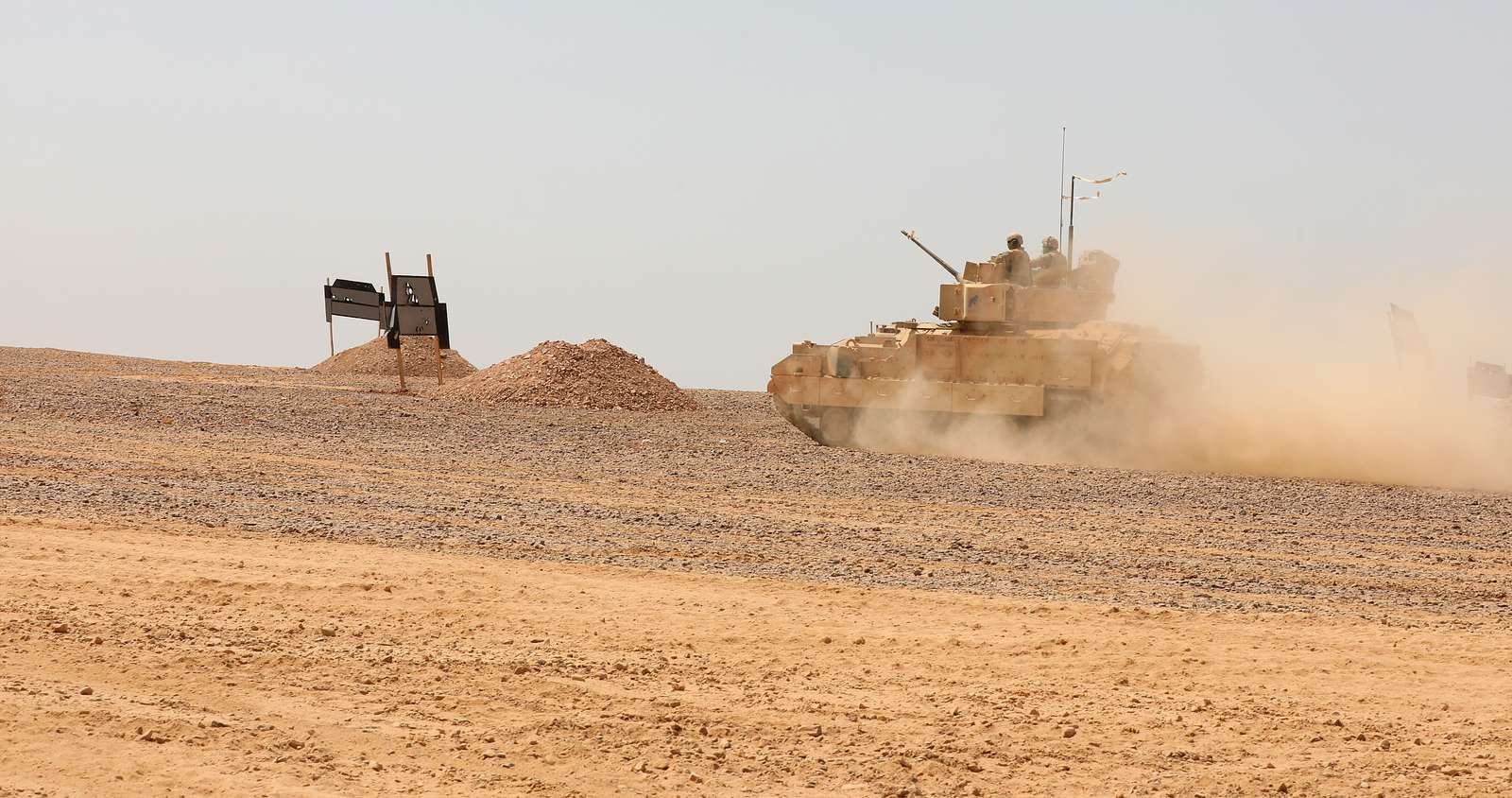 A Bradley Fighting Vehicle crew move to a fighting - NARA & DVIDS ...