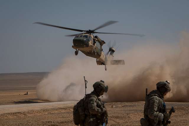 A Jordanian Helicopter Lands On The Outskirts Of A - Picryl - Public 