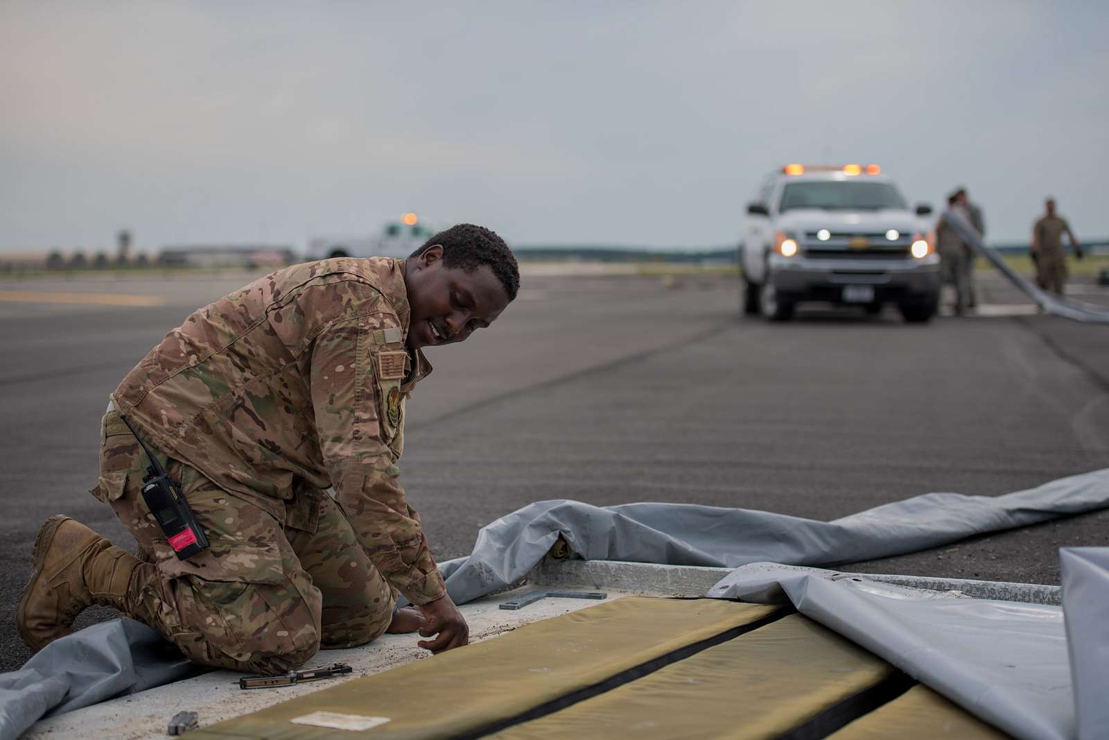 A U.S. Air Force Airman Helps Remove Aircraft Arresting - NARA & DVIDS ...