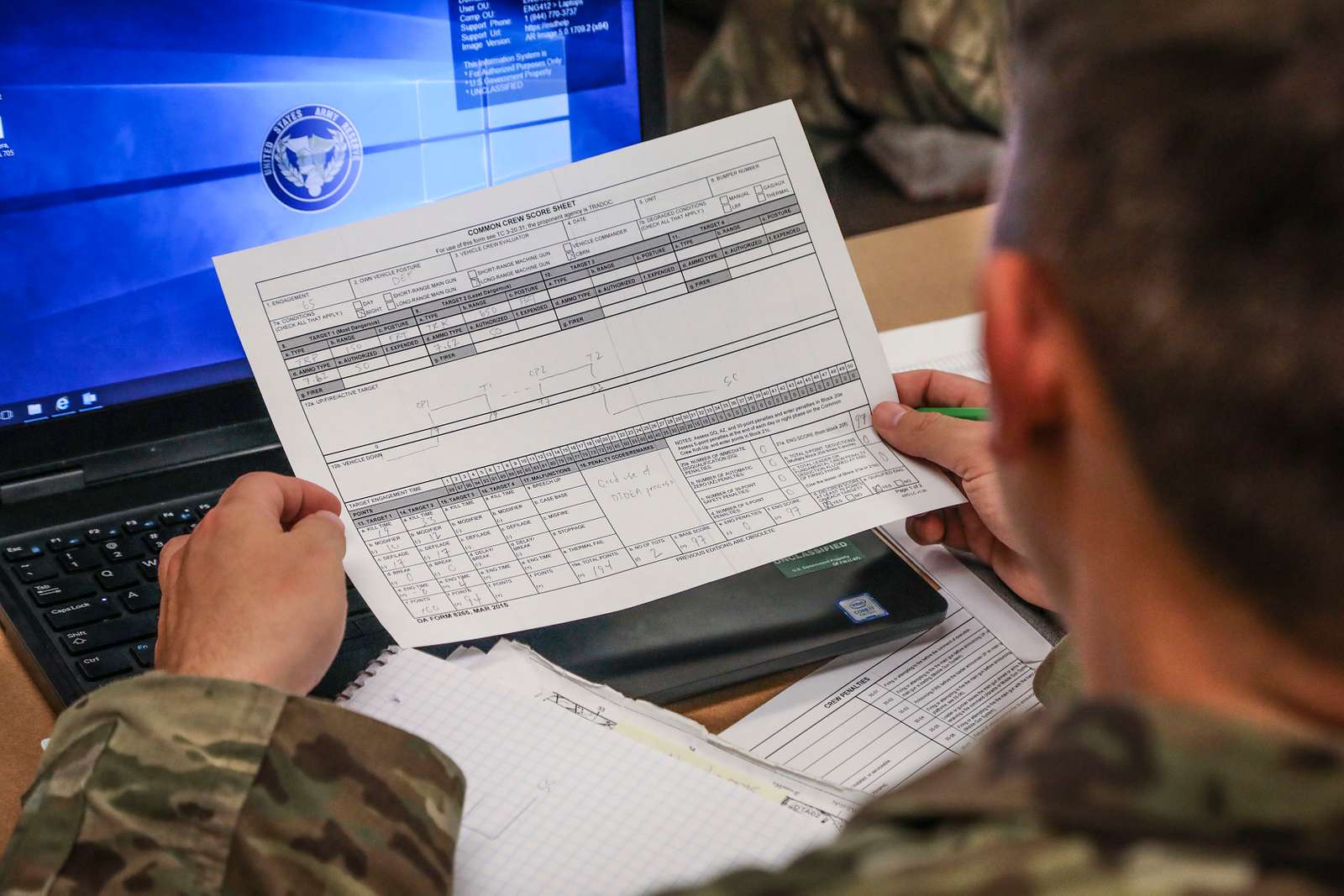 an-army-reserve-soldier-looks-over-a-common-crew-score-nara-dvids