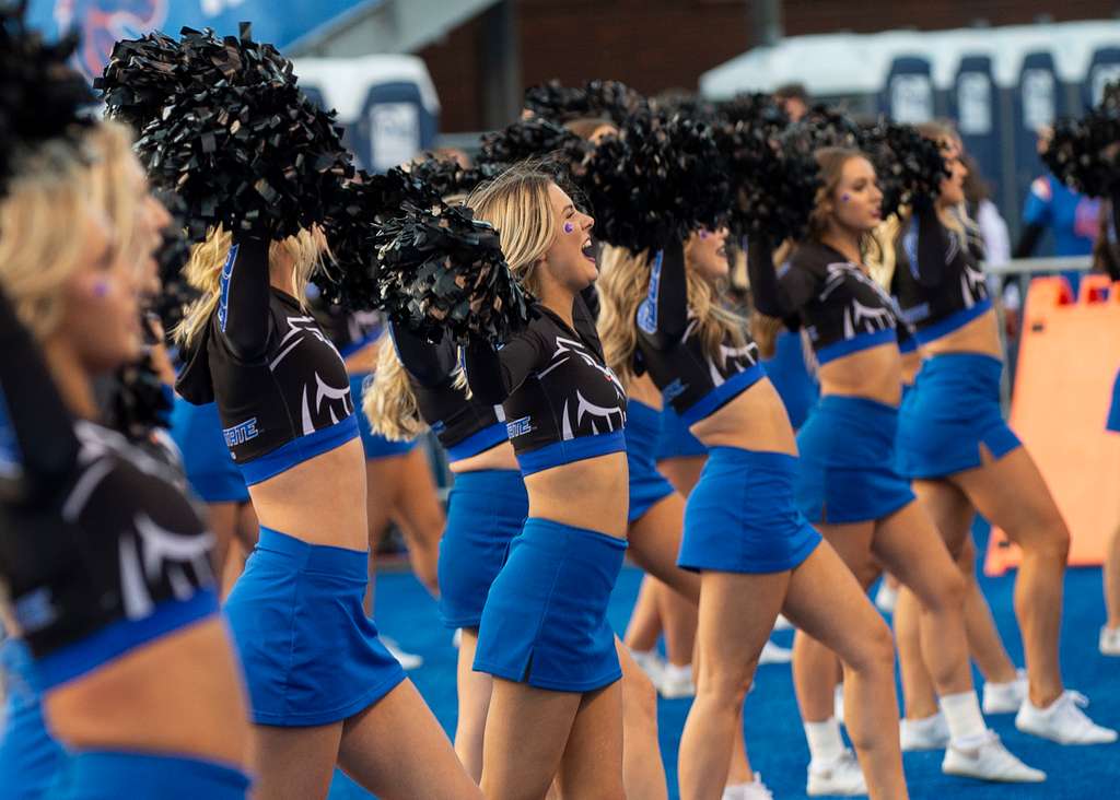 Cheerleaders for Boise State University cheer on the NARA & DVIDS